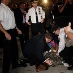 A protester is arrested